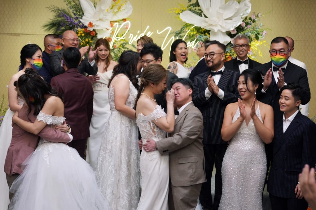 LGBTQ couples celebrate after getting married in a virtual ceremony at the Eaton HK hotel in Hong Kong on June 25, 2024. The ceremony was organised by wedding planners Next Chapter LGBT. Photo: Sam Tsang