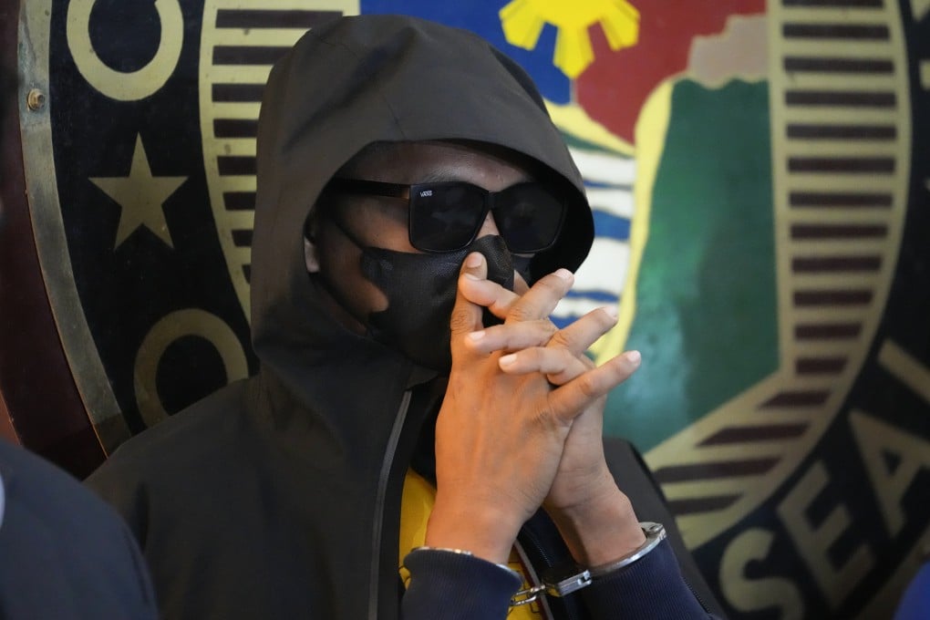 The suspect in the killing of two Australian nationals and a Filipino at a press conference in Tagaytay, the Philippines, on Wednesday following his surrender. Photo: AP