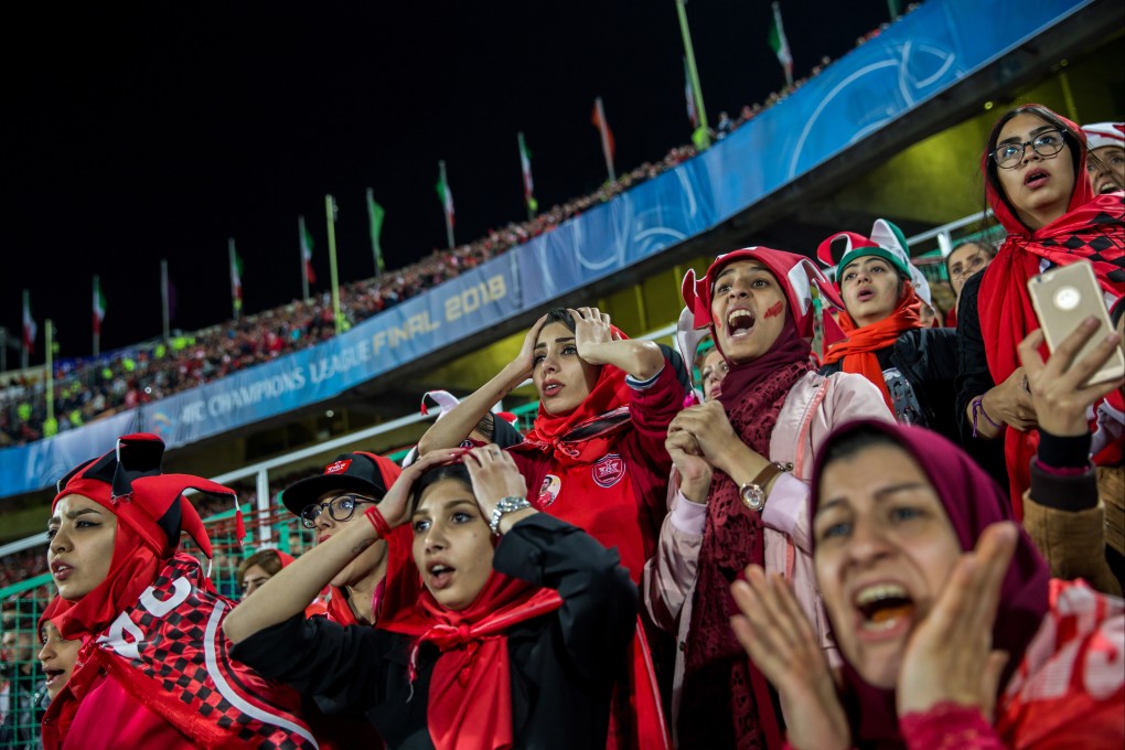 Iranian women watching an AFC Champions League Cup match between Iran’s Persepolis and Japan’s Kashima Antlers from a segregated section of a stand at the Azadi Stadium in Tehran in 2018. Photo: Forough Alaei