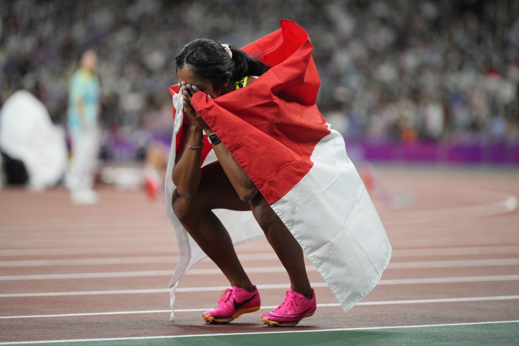 Singapore’s Shanti Pereira is overcome after winning 200m gold at the Asian Games in 2023. Photo: AP