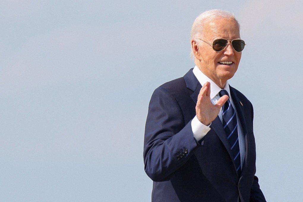US President Joe Biden waves to journalists before boarding Air Force One at Joint Base Andrews in Maryland on Monday. Photo: Reuters