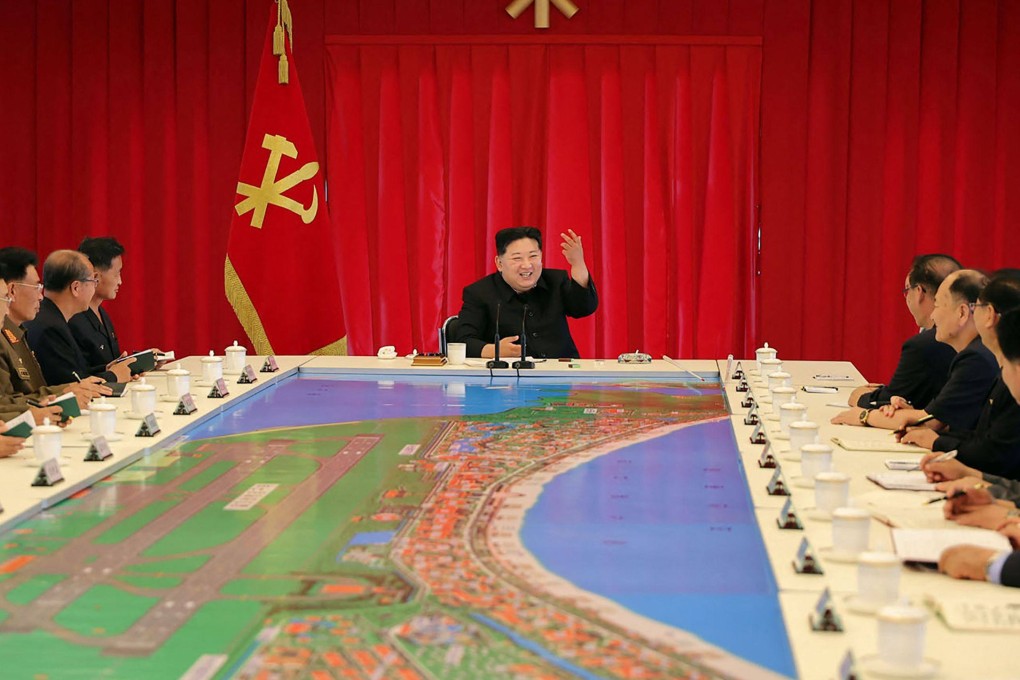 North Korean leader Kim Jong-un attends a conference at the Wonsan Kalma coast tourist area, which is currently under construction in North Korea’s Gangwon Province. Photo: KCNA via KNS/AFP