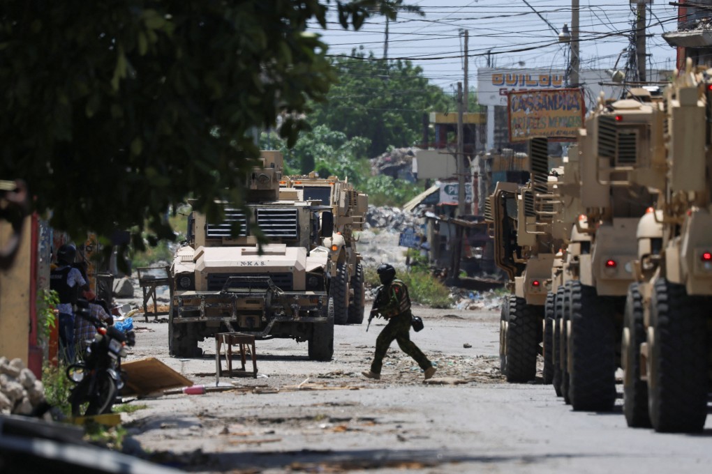 Kenyan police patrol in Port-au-Prince, Haiti, on Wednesday as part of a peacekeeping mission. Photo: Reuters