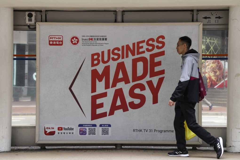 An advertisement for InvestHK is displayed at a tram stop in Hong Kong. Photo: Jelly Tse
