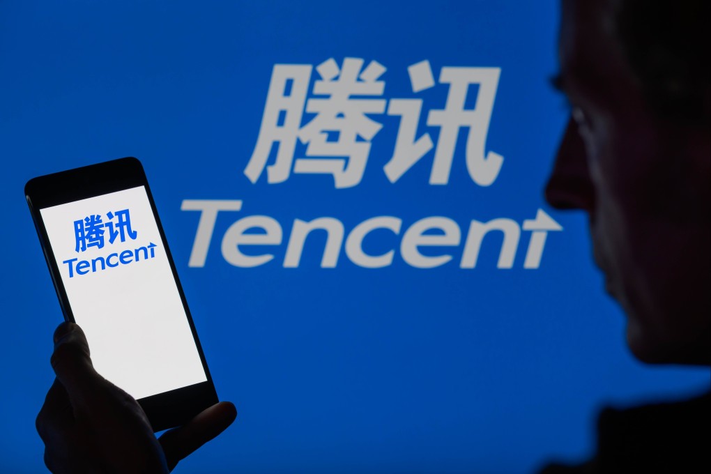 The Tencent logo is displayed on a smartphone, with the company name in the background. Photo: Shutterstock Images