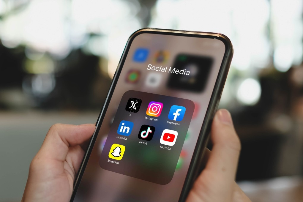 An iPhone 15 Pro showing social media application icons. Photo: Shutterstock