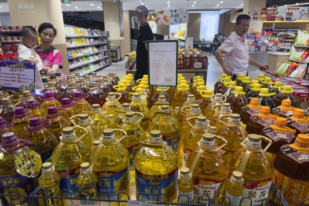 Cooking oil products are displayed at a supermarket in Beijing amid rising health fears over China’s latest food safety scandal. Photo: AP