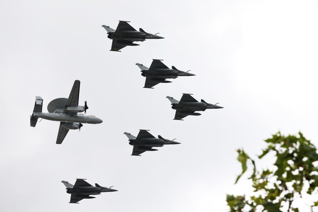 French Air Force planes perform during the Bastille Day military parade in Paris on July 14. Photo: Xinhua