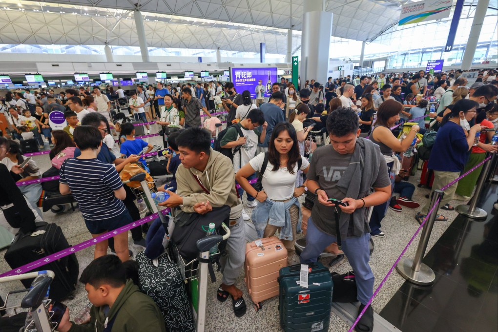 Passengers are being checked in manually at the airport. Photo: Dickson Lee