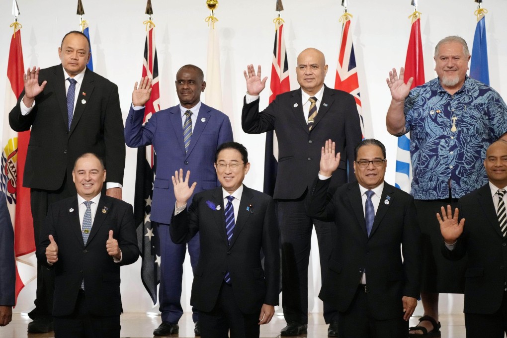 Japanese Prime Minister Fumio Kishida (bottom row, second from left) and other participants of the 10th Pacific Islands Leaders Meeting in Tokyo pose for a photo on Thursday. Photo: Kyodo