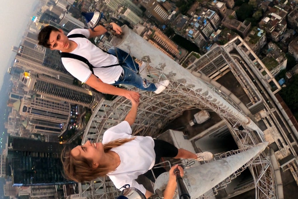 Urban explorers Ivan Beerkus and Angela Nikolau in a still from Netflix documentary Skywalkers: A Love Story. Watching the Netflix documentary is one of the best things you can do this weekend in Hong Kong, especially if the weather is unkind. See what else we recommend. Photo: Netflix
