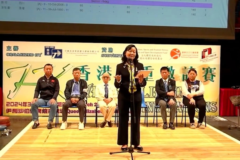 Members of the Hong Kong, China Weightlifting and Powerlifting Association have claimed former chairwoman Dr Josephine Ip (centre) is still running the governing body despite having resigned after calling Hong Kong “a small country”. Photo: YouTube/HKWPA