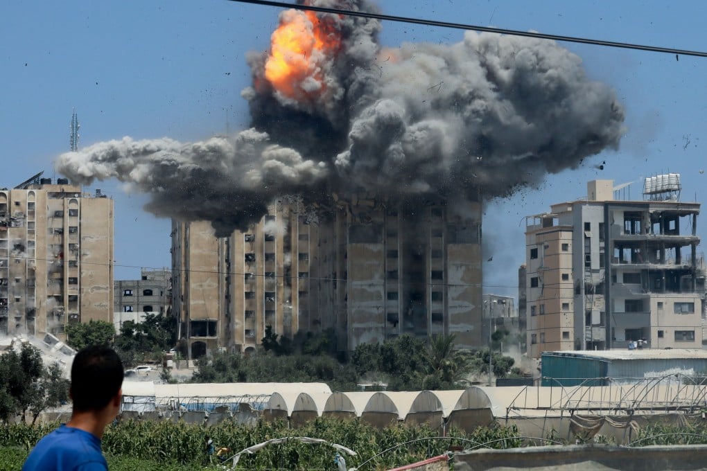 A residential building explodes in Nuseirat in the central Gaza Strip amid the Israel-Gaza conflict on July 20. Photo: Reuters