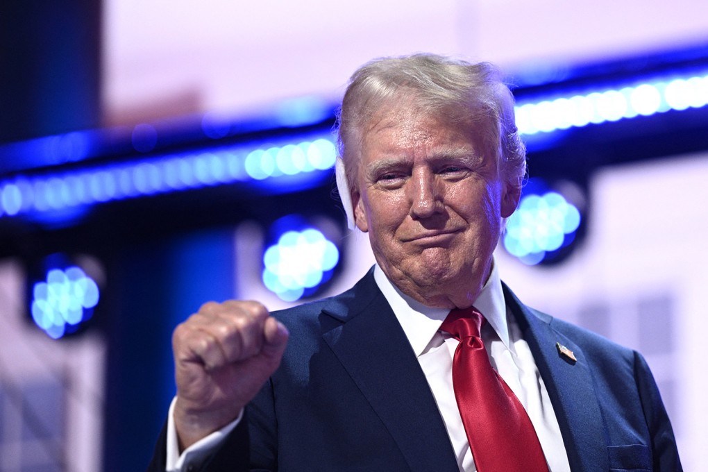 Republican US presidential candidate Donald Trump holds up a fist at the Republican National Convention in Milwaukee, Wisconsin, on Thursday. Photo: AFP via TNS