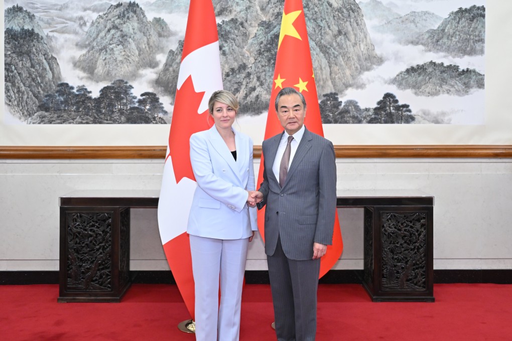 Chinese Foreign Minister Wang Yi with his Canadian counterpart  Melanie Joly in Beijing on Friday. Photo: Xinhua