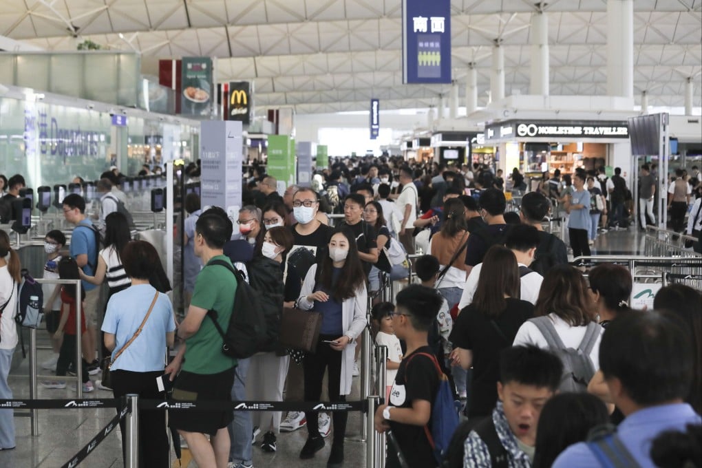 The city’s airport services slowed to a crawl when airlines were forced to resort to processing passengers manually. Photo: Xiaomei Chen