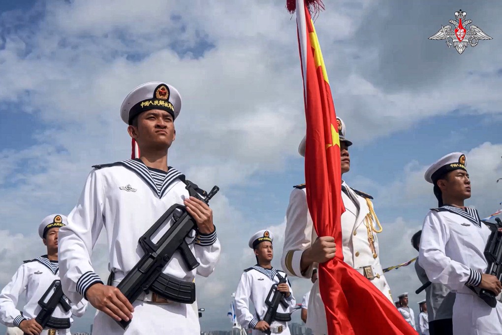 Chinese military sailors attend a ceremony of the China-Russia joint naval exercise in Zhanjiang in Guangdong province on July 14, in this photo taken from a video released by the Russian Defence Ministry Press Service. The drills began days after Nato allies called Beijing a “decisive enabler” of the war in Ukraine. Photo: Russian Defense Ministry Press Service via AP