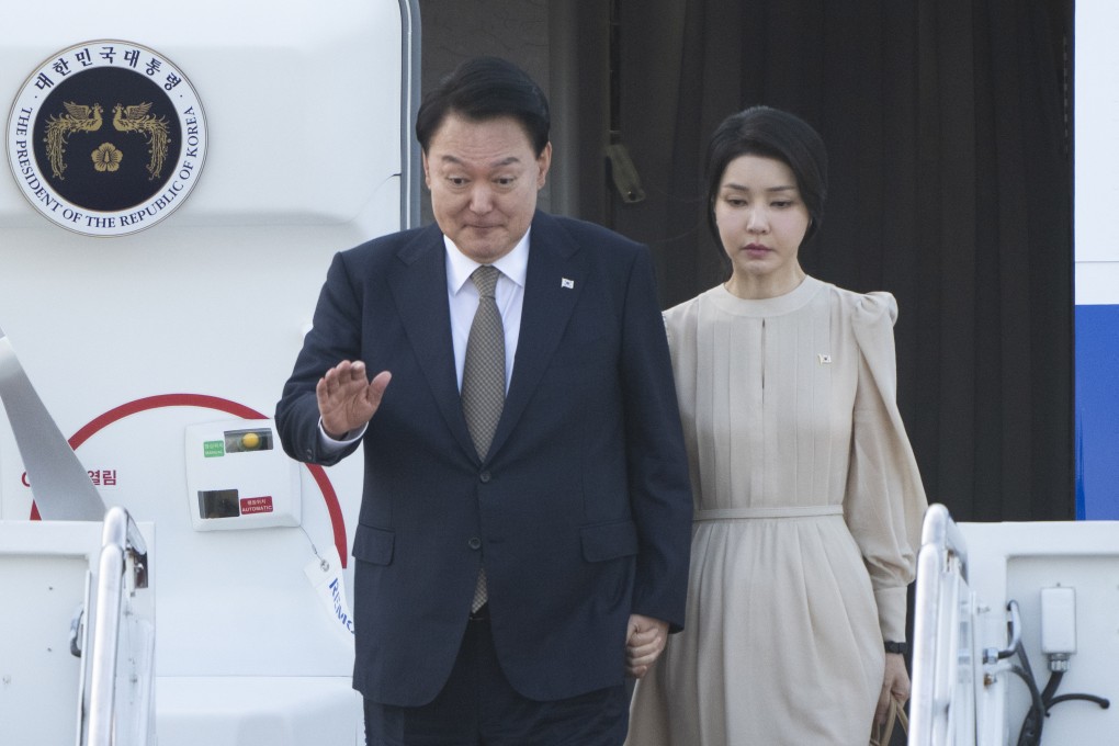 South Korea’s President Yoon Suk-yeol accompanied by first lady Kim Keon-hee arrive on July 10, at Andrews Air Force Base to attend the Nato summit in Washington. Photo: AP