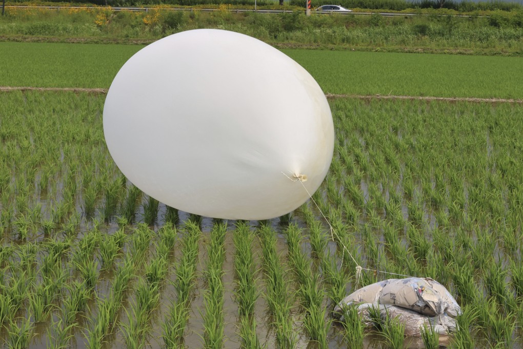 A balloon presumably sent by North Korea, is seen in a paddy field in Incheon, South Korea, on June 10. Photo: AP