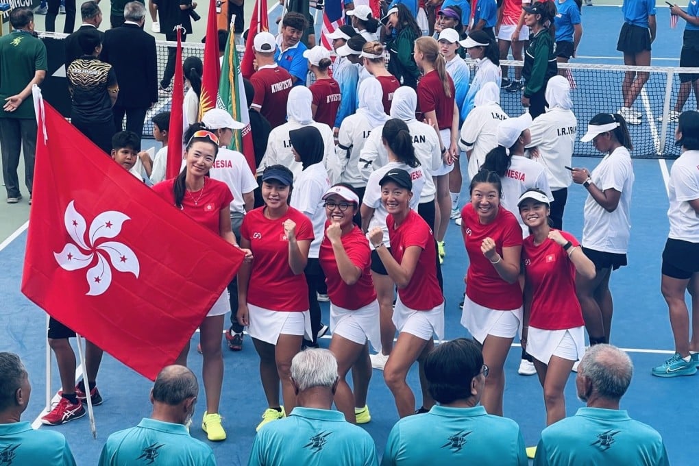 Hong Kong’s players are elated after clinching promotion in the Billie Jean King Cup on Saturday. Photo: HKCTA
