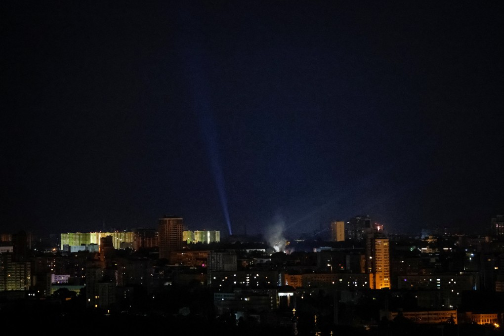 Ukrainian servicemen use searchlights as they look for drones in the sky over the city during a Russian drone strike, amid Russia’s attack on Ukraine, in Kyiv, Ukraine, on Sunday. Photo: Reuters