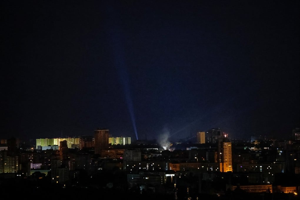 Ukrainian servicemen use searchlights as they look for drones in the sky over the city during a Russian drone strike, amid Russia’s attack on Ukraine, in Kyiv, Ukraine, on Sunday. Photo: Reuters