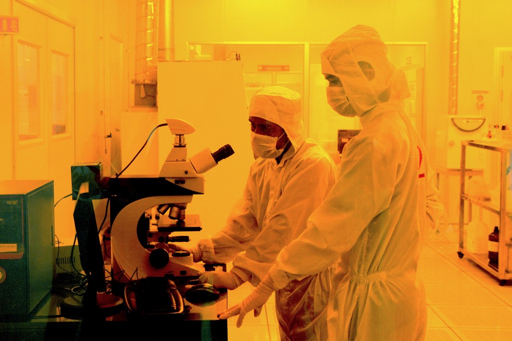 Researchers working inside the semiconductor fabrication lab at the Centre for Nano Science and Engineering at the Indian Institute of Science in Bangalore. Photo: AFP