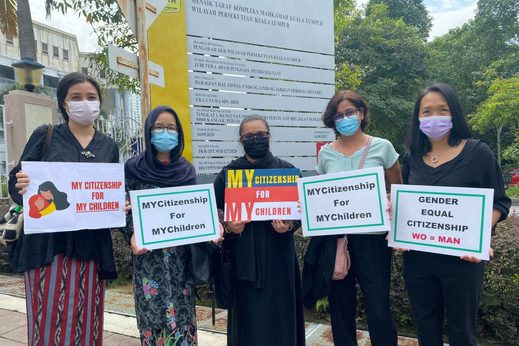 Plaintiffs in a case challenging a Malaysian law preventing women passing citizenship onto children born overseas, pictured outside court in 2021. Photo: Family Frontiers / Handout via AFP