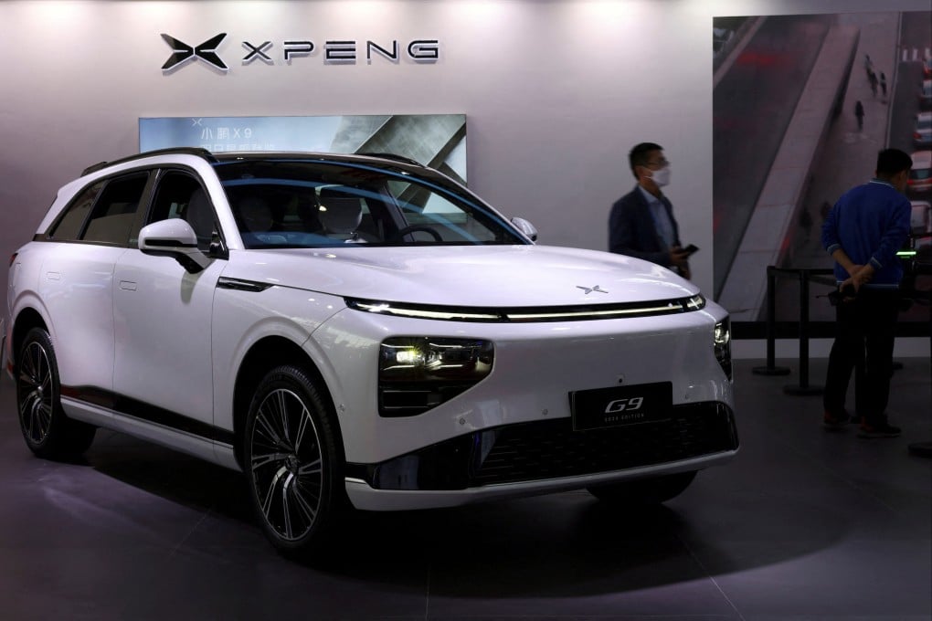 Xpeng’s electric vehicle (EV) G9 is seen displayed at the Xpeng booth during the first China International Supply Chain Expo (CISCE) in Beijing, China November 28, 2023. Volkswagen Group has extended its collaboration with Chinese electric vehicle Xpeng to develop systems that enhance intelligent driving abilities. Photo: Reuters