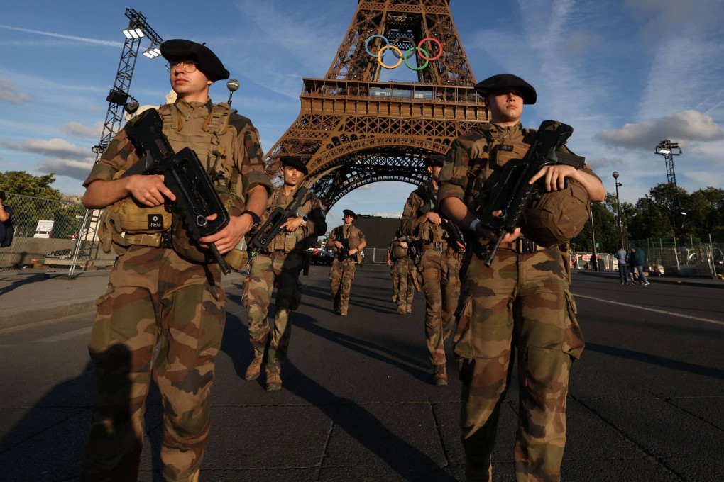 French soldiers patrol near the Eiffel Tower ahead of the Paris Olympics. Photo: AFP