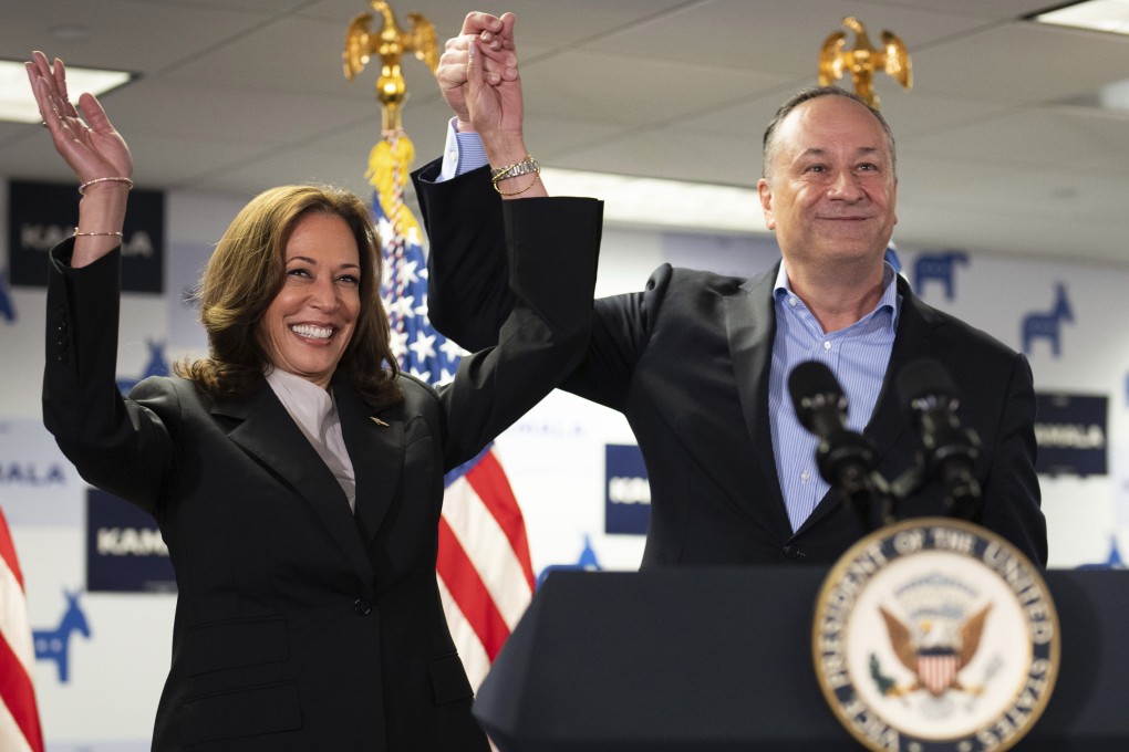 US Vice-President Kamala Harris celebrates with her husband Doug Emhoff at her campaign headquarters in Wilmington, Delaware, on Monday. Photo: The New York Times via AP