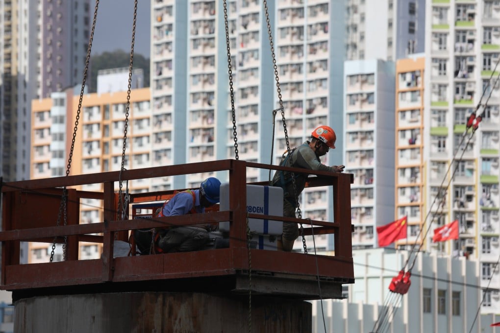 Workers at a public housing construction site in Cheung Sha Wan. Photo: Xiaomei Chen