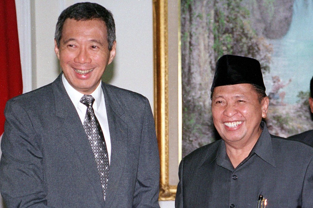Indonesian Vice-President Hamzah Haz (right) meets Lee Hsien Loong, then Singapore’s deputy prime minister, in Jakarta in 2004. Photo: AFP