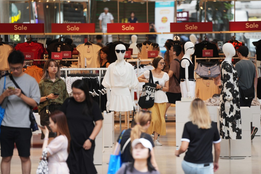 Consumers shop in Causeway Bay. The finance chief has noted e-shopping accounted for only 8 per cent of retail sales in Hong Kong last year, compared with the mainland’s 28 per cent. Photo: Sam Tsang