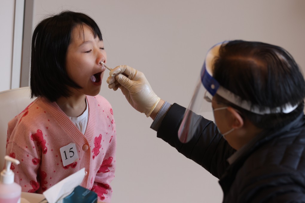 A young girl gets a nasal spray flu vaccine instead of a jab earlier this year. Photo: Yik Yeung-man