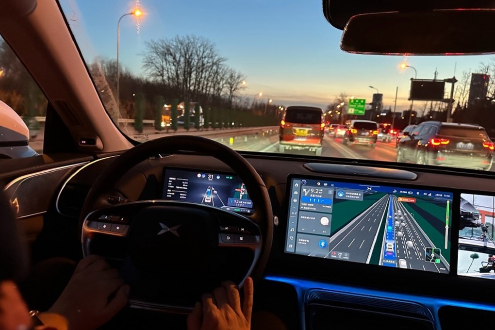 Drivers using Xpeng’s self-driving software are required by law to place their hands on the steering wheel to override the system during emergencies. Photo: Weibo