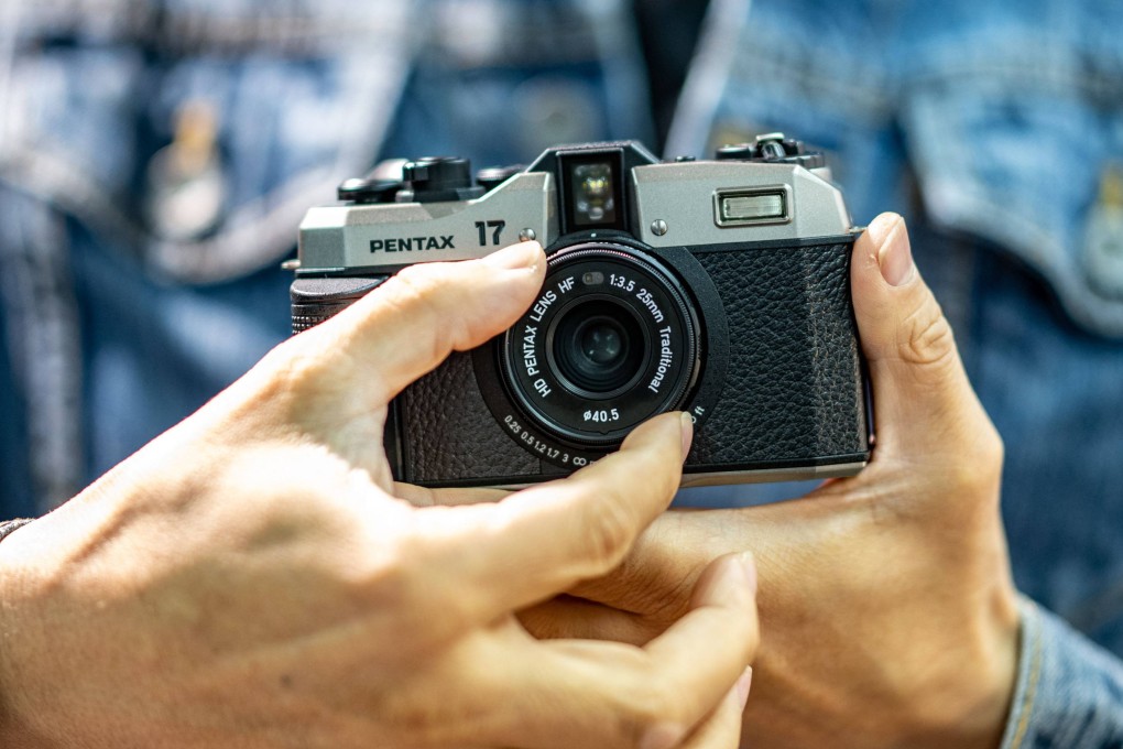 The Pentax 17 is the Japanese brand’s first analogue camera in two decades, and taps into a growing trend of young people taking old-fashioned photos for social media. Photo: AFP