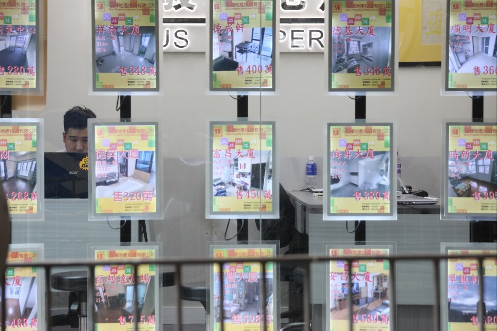 A real estate agent at his shop in Yau Ma Tei on 20 July 2024. Photo: Xiaomei Chen