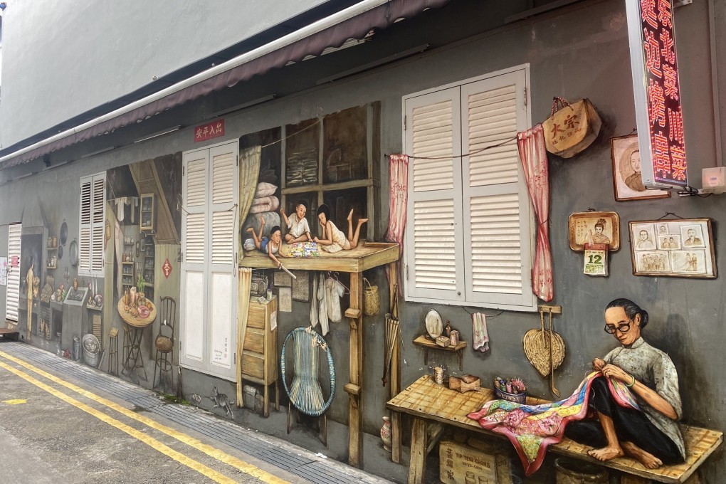 A mural in Singapore’s Chinatown by Yip Yew Chong is an example of efforts by Singaporeans to show each other, and visitors, sides to the city state they may not have appreciated. Photo: Tamara Hinson