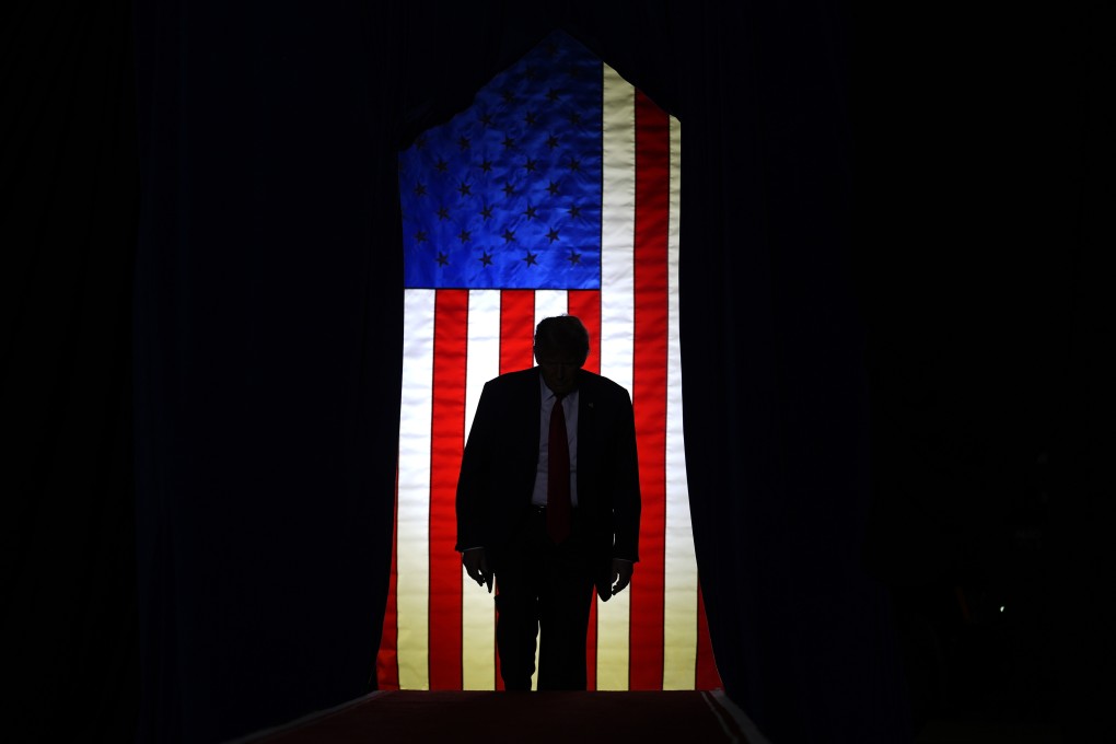 Former US President Donald Trump steps on stage at a campaign event in New Hampshire earlier this year. Photo: AP