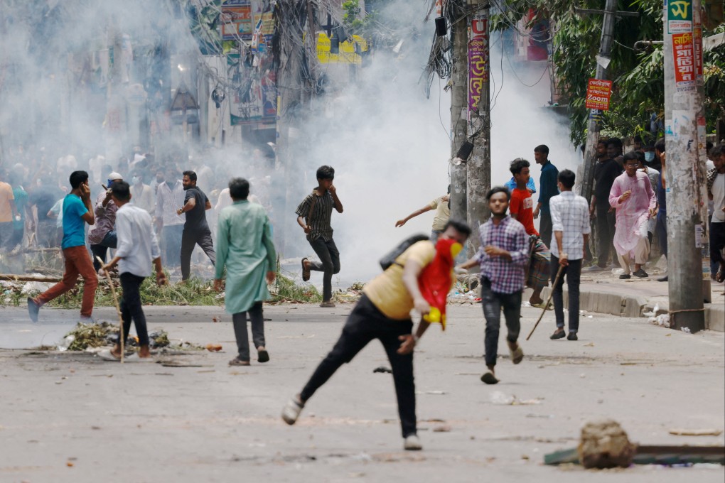Protesters clash with Border Guard Bangladesh and the police outside the state-owned Bangladesh Television as violence erupts across the country after anti-quota protests by students, in Dhaka. Photo: Reuters