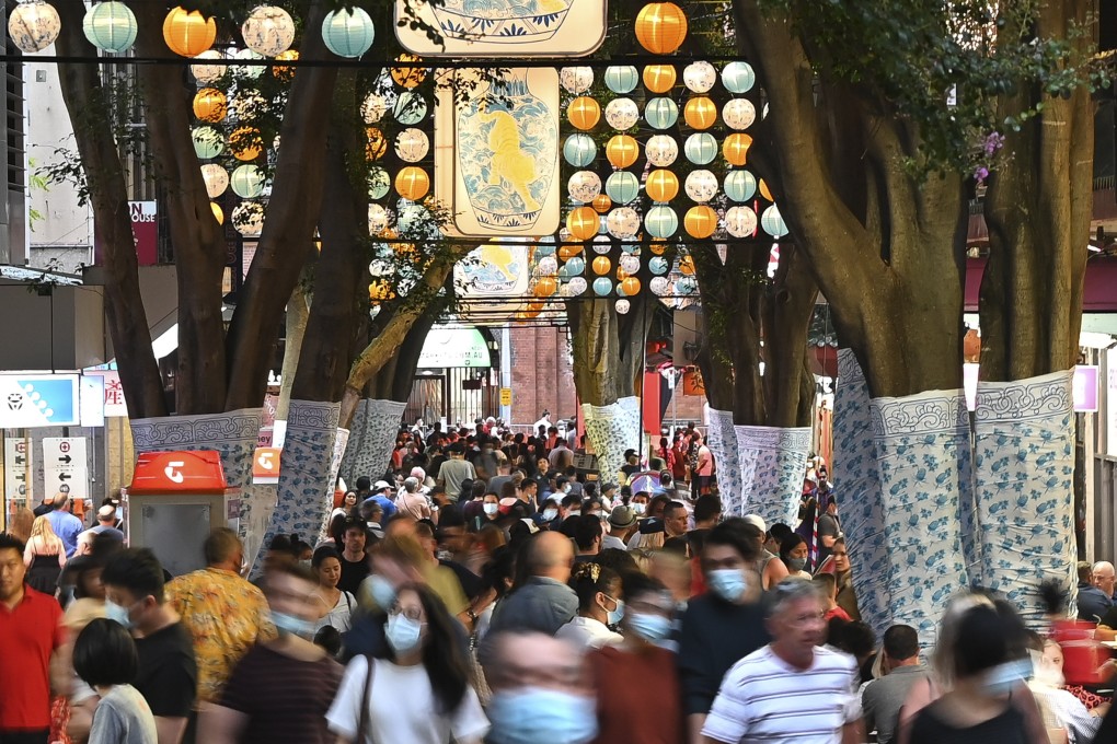 Lanterns hang from above as crowds flock to Dixon Street Mall as part of Lunar New Year celebrations in Chinatown, Sydney, Australia, in January 2022. Photo: Anadolu Agency via Getty Images