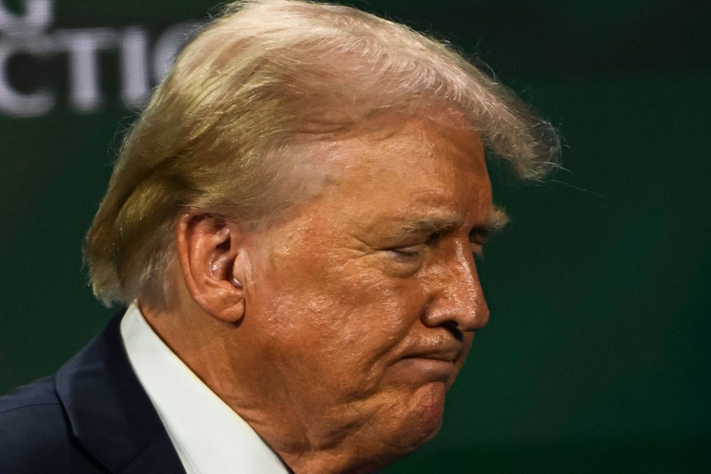 Former US President Donald Trump was seen without a bandage on his ear for the first time since an assassination attempt on July 13. Photo: AFP