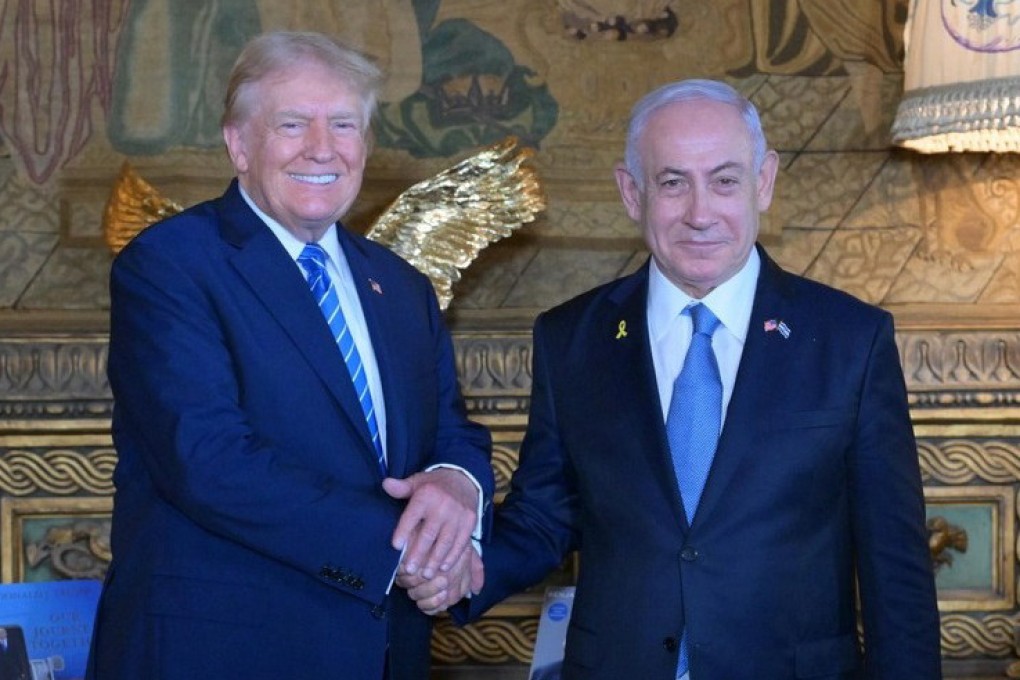 Israeli Prime Minister Benjamin Netanyahu (right) is welcomed by former US president Donald Trump at Mar-a-Lago on Friday. Photo: Amos Ben-Gershom/GPO via dpa