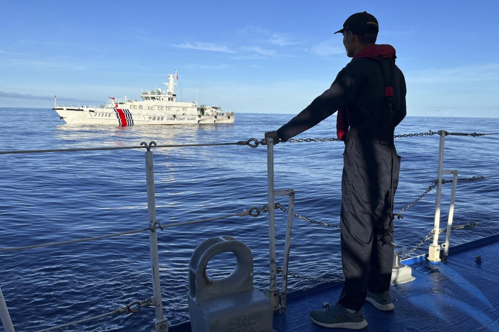 A Chinese coastguard vessel blocks the Philippine coastguard ship BRP Cabra as it approaches Second Thomas Shoal during a resupply mission in the disputed South China Sea on November 10, 2023. Photo: AP