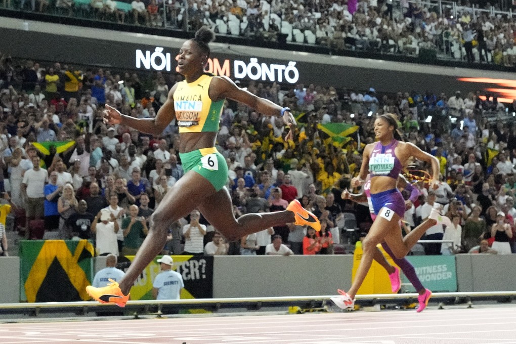 Shericka Jackson (left) won the 200 metres at the 2023 World Championships and is looking to break the world record in Paris. Photo: AP