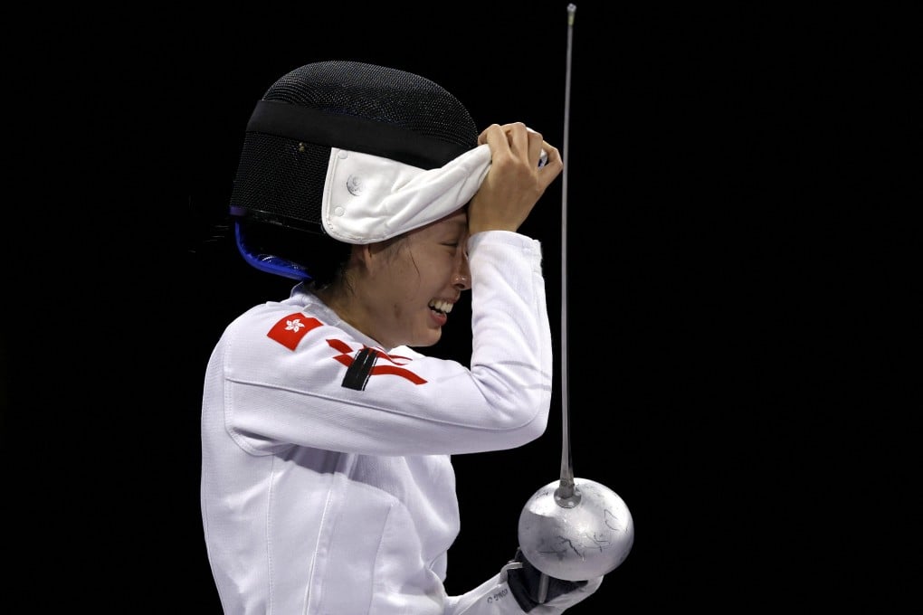 Vivian Kong of Hong Kong clinches the gold medal in the Olympic épée competition. Photo: Reuters