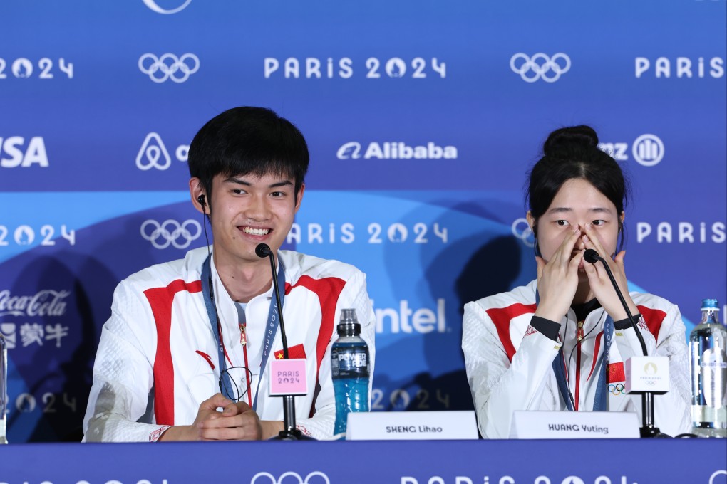 Chinese teenagers Sheng Lihao (left) and Huang Yuting (right) made headlines for their gold medal win – and Weibo handles. Photo: Xinhua