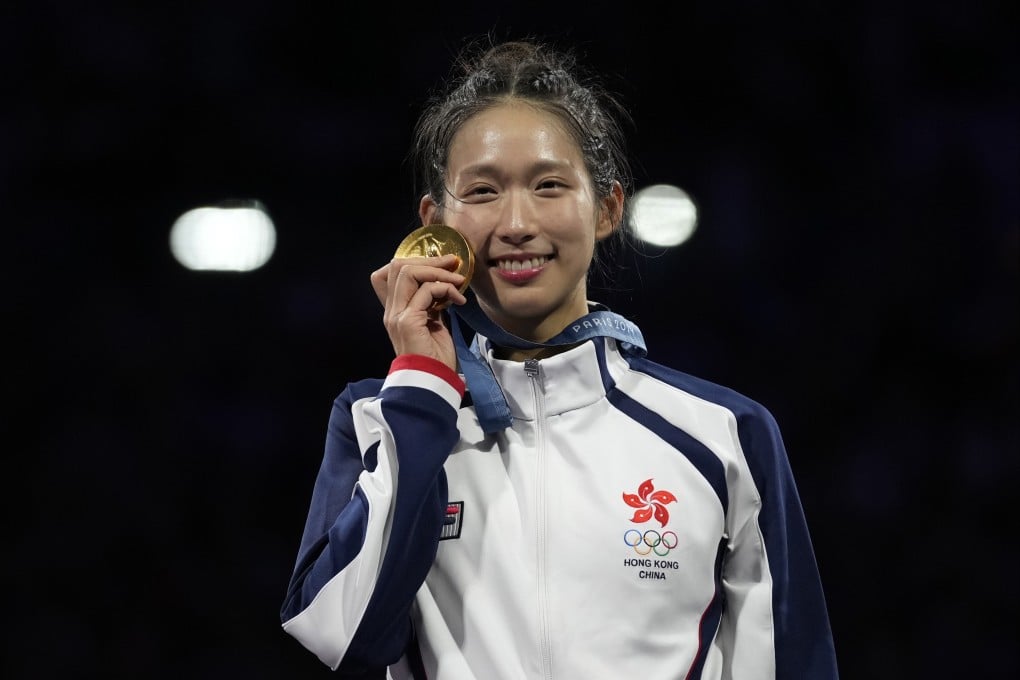 Hong Kong’s Vivian Kong with her gold medal in the women’s individual epee. Photo: AP