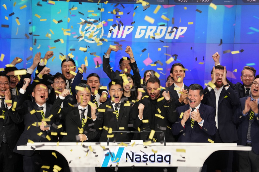 NIP Group chairman Mario Ho Yau-kwan (front row, fourth from left), and his colleagues cheer during the bell-ringing ceremony at the Nasdaq MarketSite in Times Square, New York City, on Friday. Photo: X/ NasdaqExchange